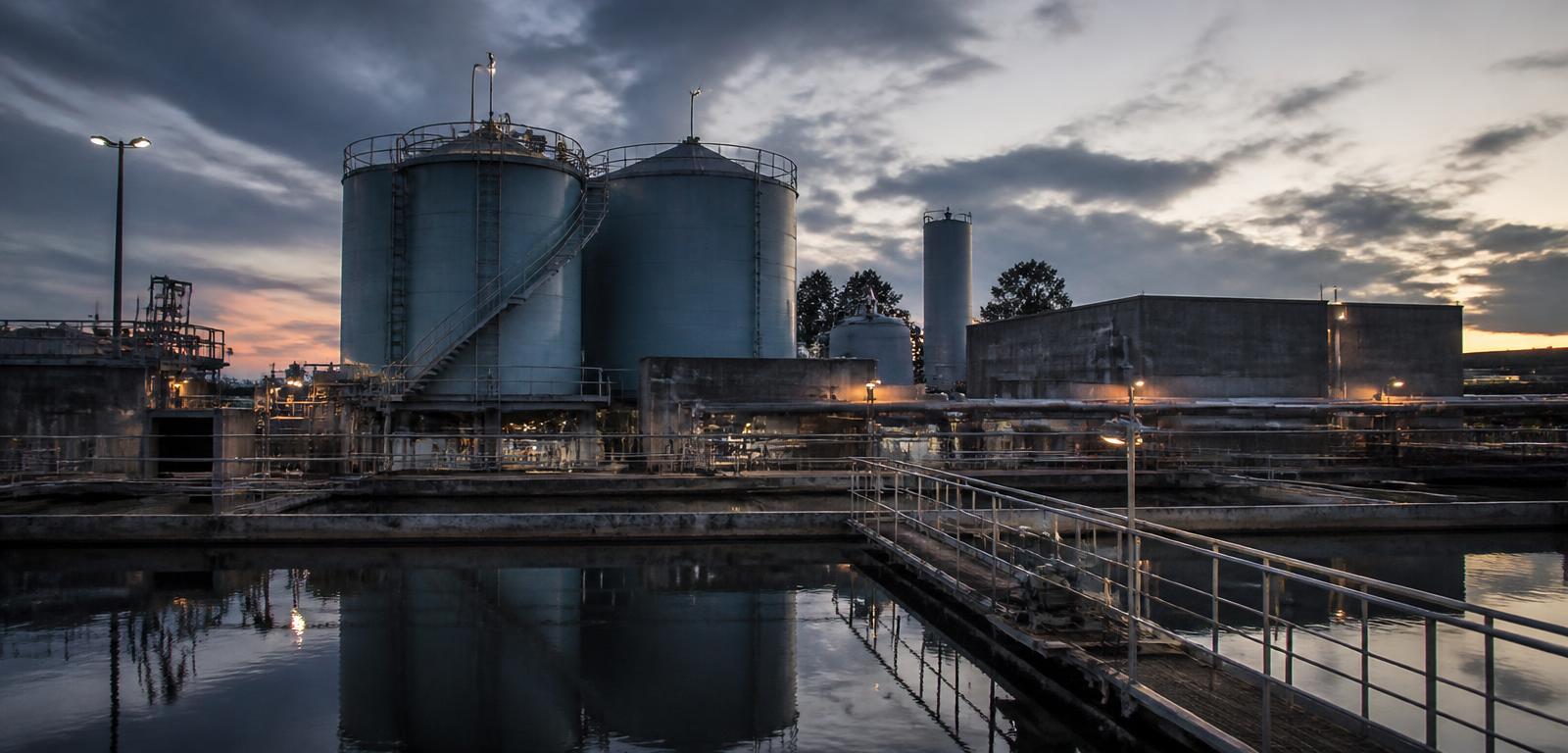 Industrial plant with steel tanks and pipework at a remote facility
